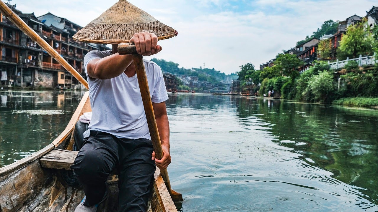 Boat with man rowing